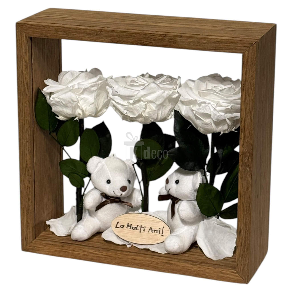 Aranjament de masă cu flori criogenate și ursuleți, în ramă de 27x27cm, cu mesaj personalizat pentru aniversări.